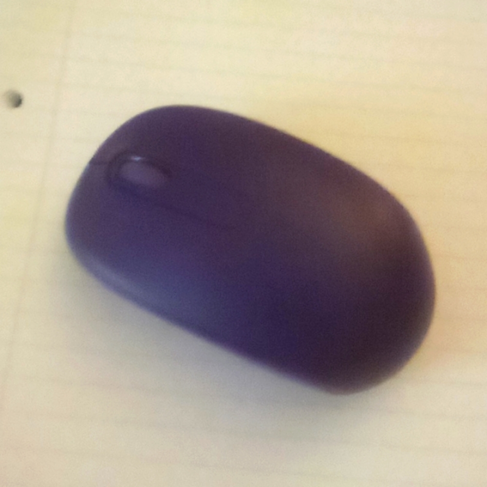 A Purple Wireless Mouse